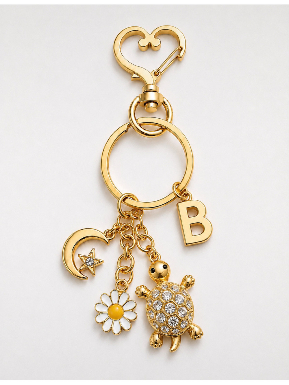 Gold Tone Personalized Keychain with Letter Charm and Decorative Pendants